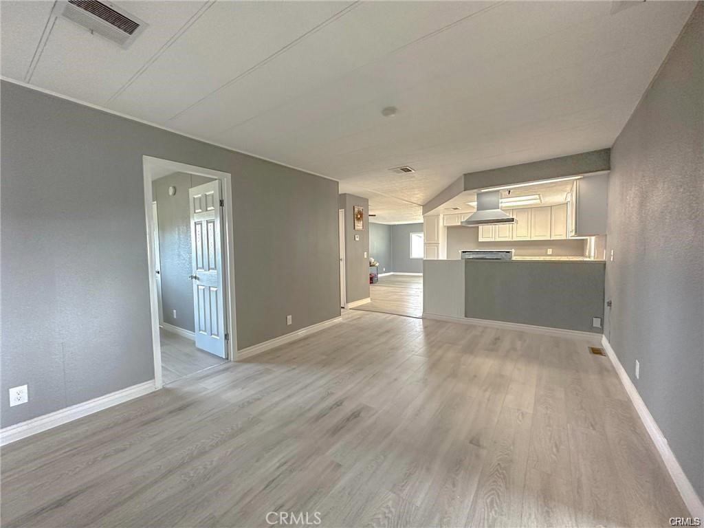 28160 Patterson Avenue Winchester, CA 92596 - Photo 38 of 57 a view of empty room with wooden floor