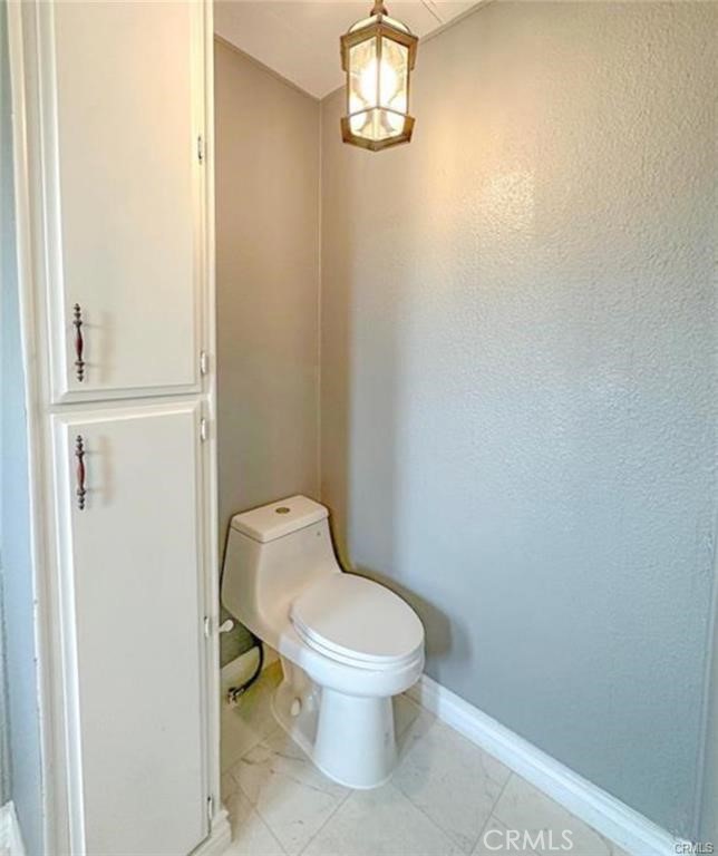 28160 Patterson Avenue Winchester, CA 92596 - Photo 4 of 57 a white toilet sitting next to a shower