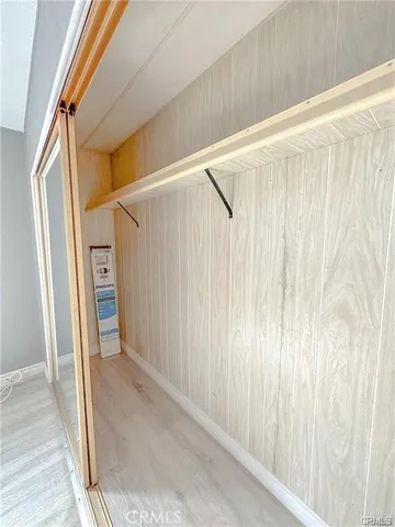 a kitchen with a sink cabinets appliances and a window