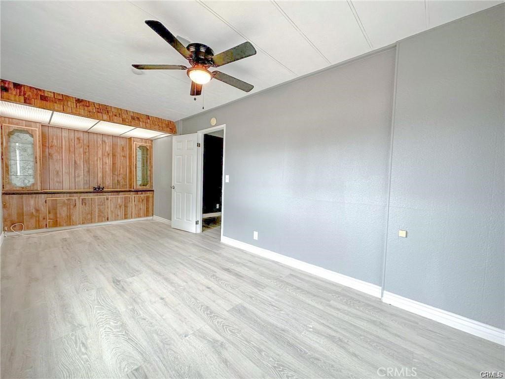 28160 Patterson Avenue Winchester, CA 92596 - Photo 47 of 57 a view of empty room with wooden floor