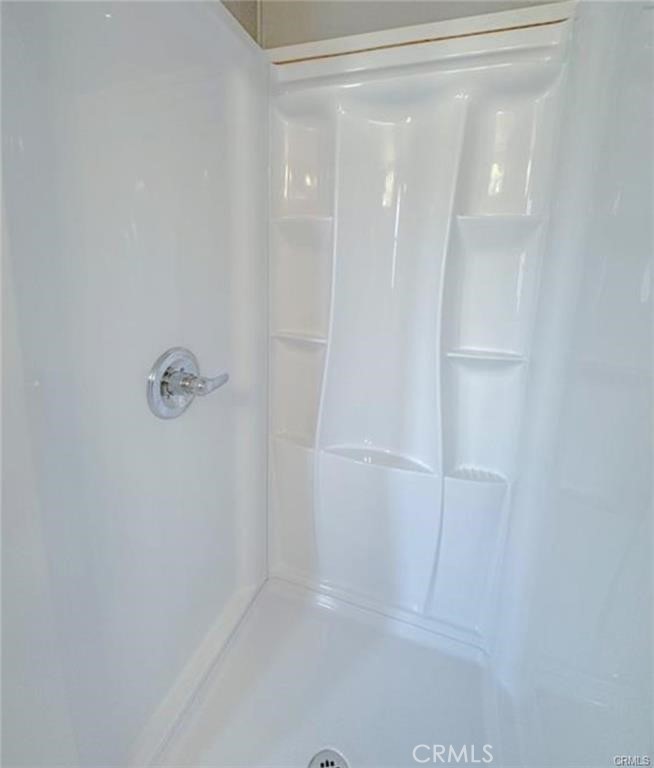 28160 Patterson Avenue Winchester, CA 92596 - Photo 7 of 57 a bathroom with a glass shower door