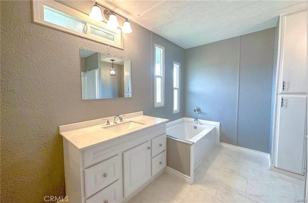 28160 Patterson Avenue Winchester, CA 92596 - Photo 10 of 57 a bathroom with a sink and a mirror