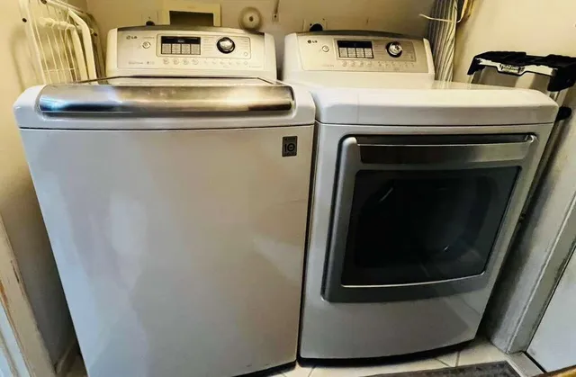 a utility room with dryer and washer