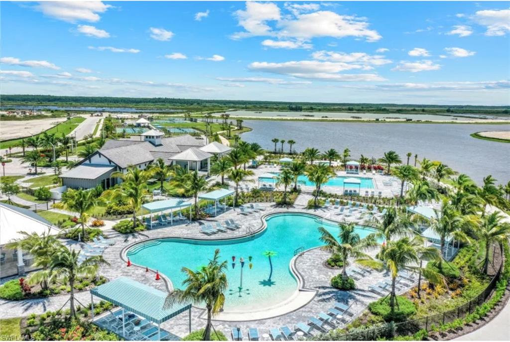 4621 Centaurus Circle Naples, FL 34120 - Photo 27 of 47 Bird's eye view of a pool and a large body of water