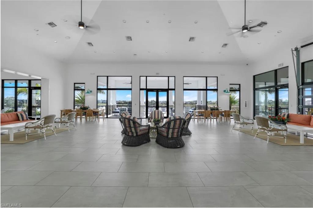 4621 Centaurus Circle Naples, FL 34120 - Photo 30 of 47 Lakehouse featuring high vaulted ceiling