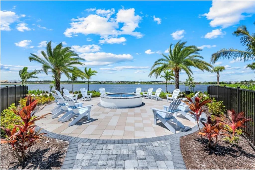 4621 Centaurus Circle Naples, FL 34120 - Photo 32 of 47 View of patio with a water view and a jacuzzi