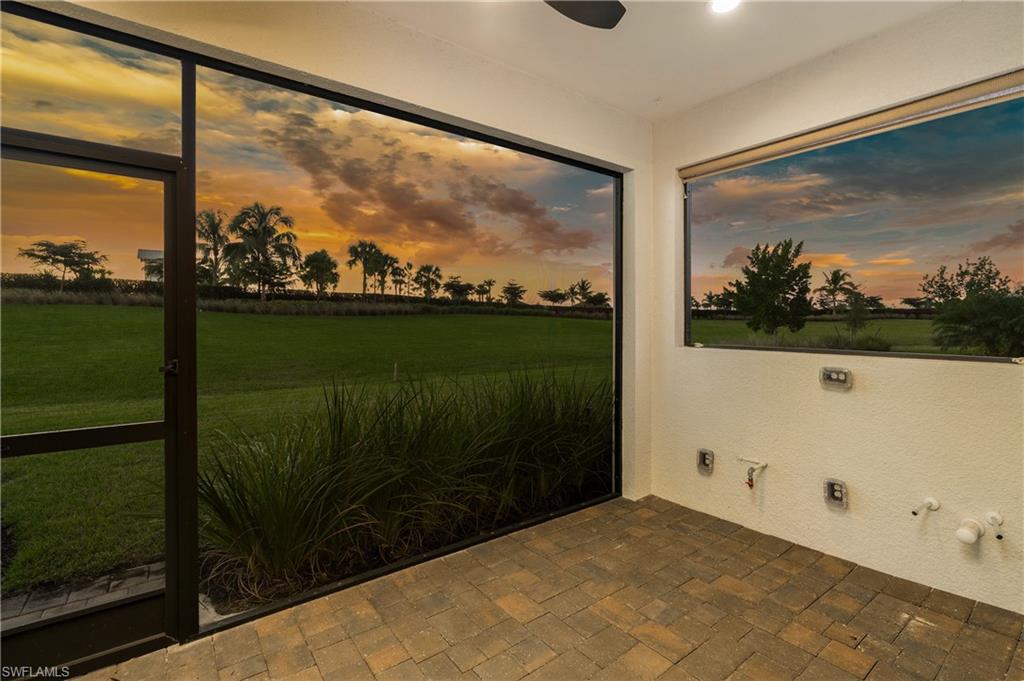 4621 Centaurus Circle Naples, FL 34120 - Photo 45 of 47 Unfurnished sunroom with brick patterned floors