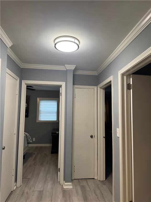 103 Wooten Drive Rome, GA 30165 - Photo 12 of 13 a view of a hallway with wooden floor and closet area