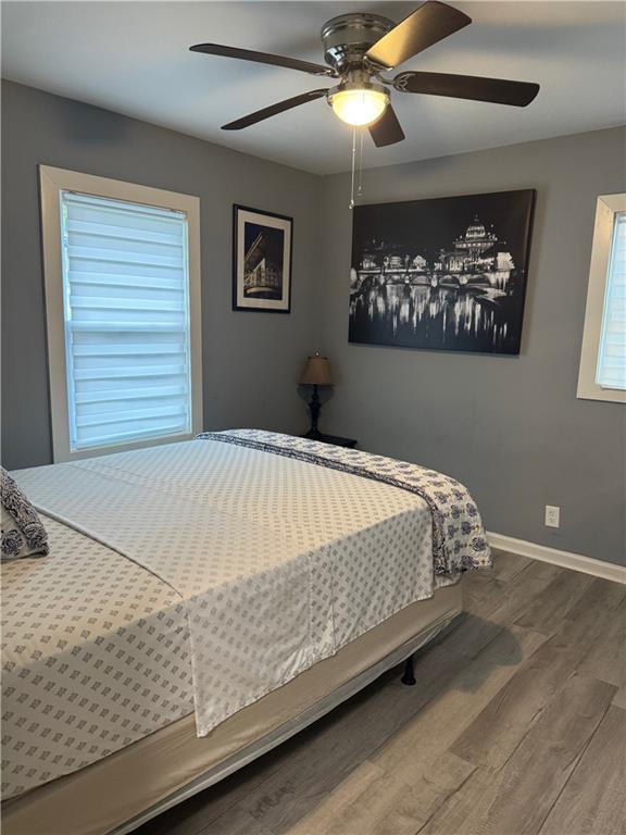 103 Wooten Drive Rome, GA 30165 - Photo 5 of 13 a bed sitting in a bedroom next to a window