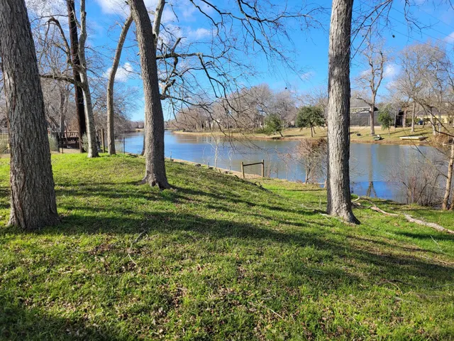 a backyard of a house with lots of green space