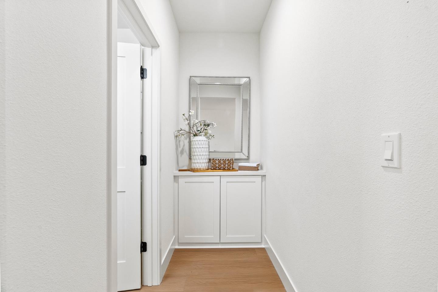 947 Woodside Road Redwood City, CA 94061 - Photo 33 of 51 a bathroom with a sink and a mirror