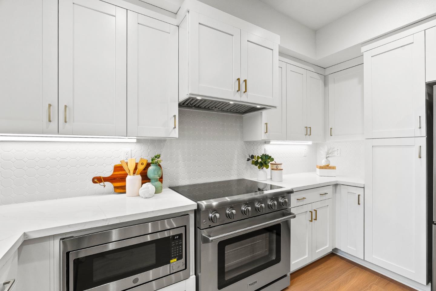 947 Woodside Road Redwood City, CA 94061 - Photo 40 of 51 a white stove top oven sitting inside of a kitchen