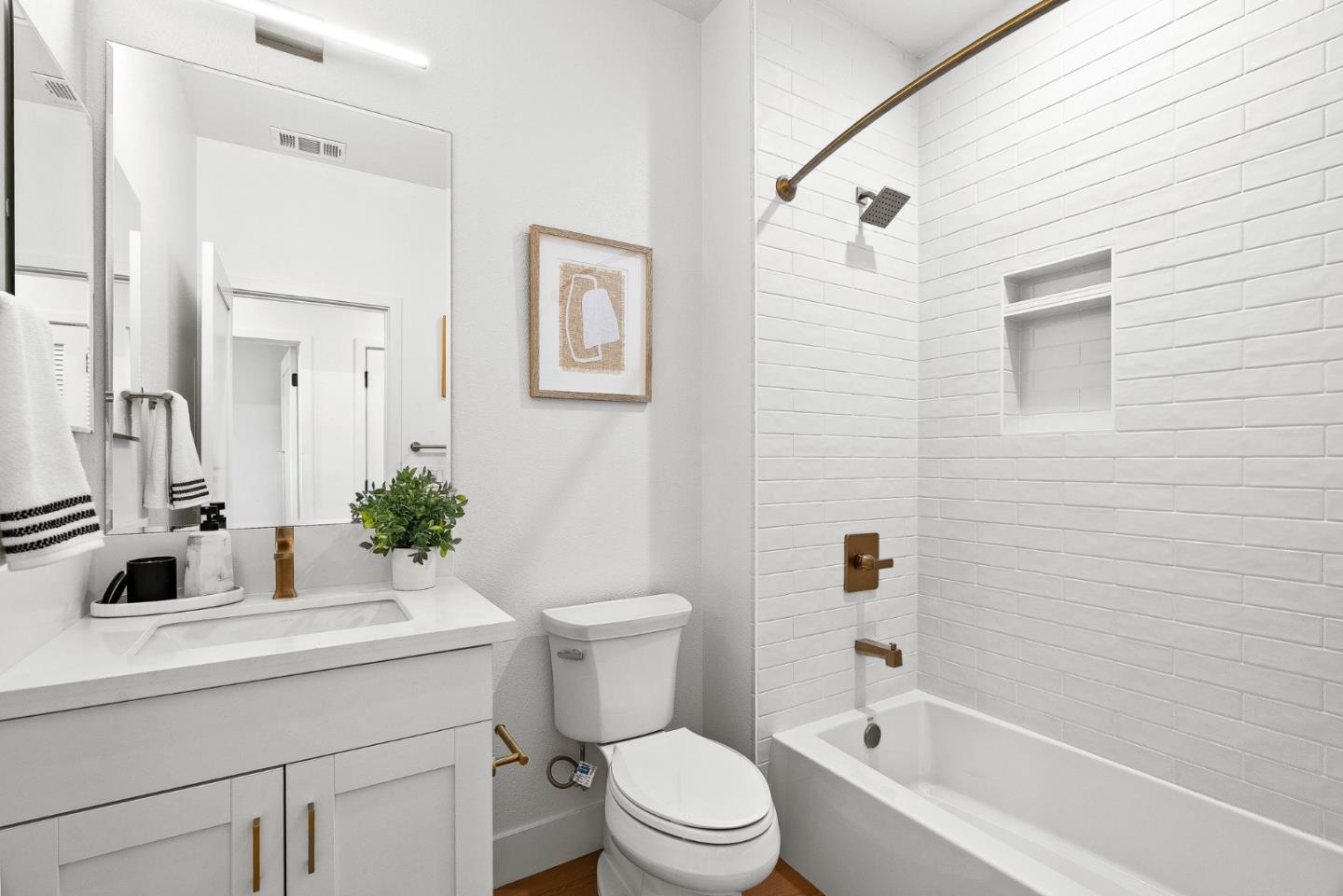 947 Woodside Road Redwood City, CA 94061 - Photo 47 of 51 a bathroom with a sink toilet and shower