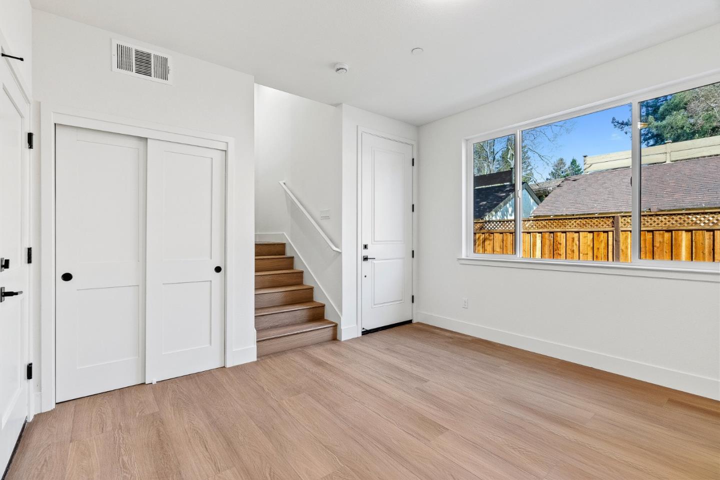 947 Woodside Road Redwood City, CA 94061 - Photo 5 of 51 a view of an entryway with wooden floor