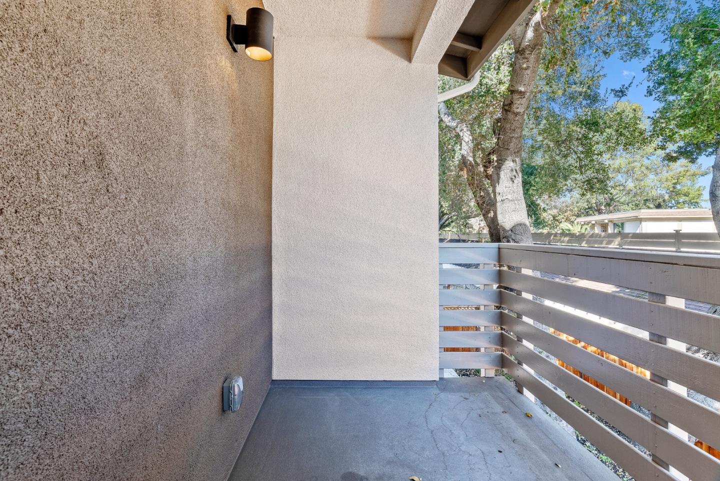 947 Woodside Road Redwood City, CA 94061 - Photo 7 of 51 a view of an empty room with a window