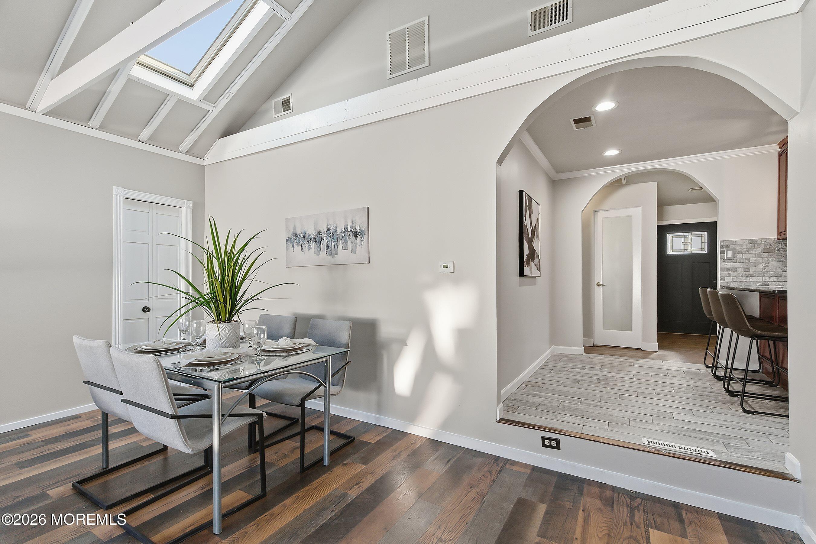 215 Sunset Lane Howell, NJ 07731 - Photo 11 of 27 a view of a livingroom with furniture and a potted plant