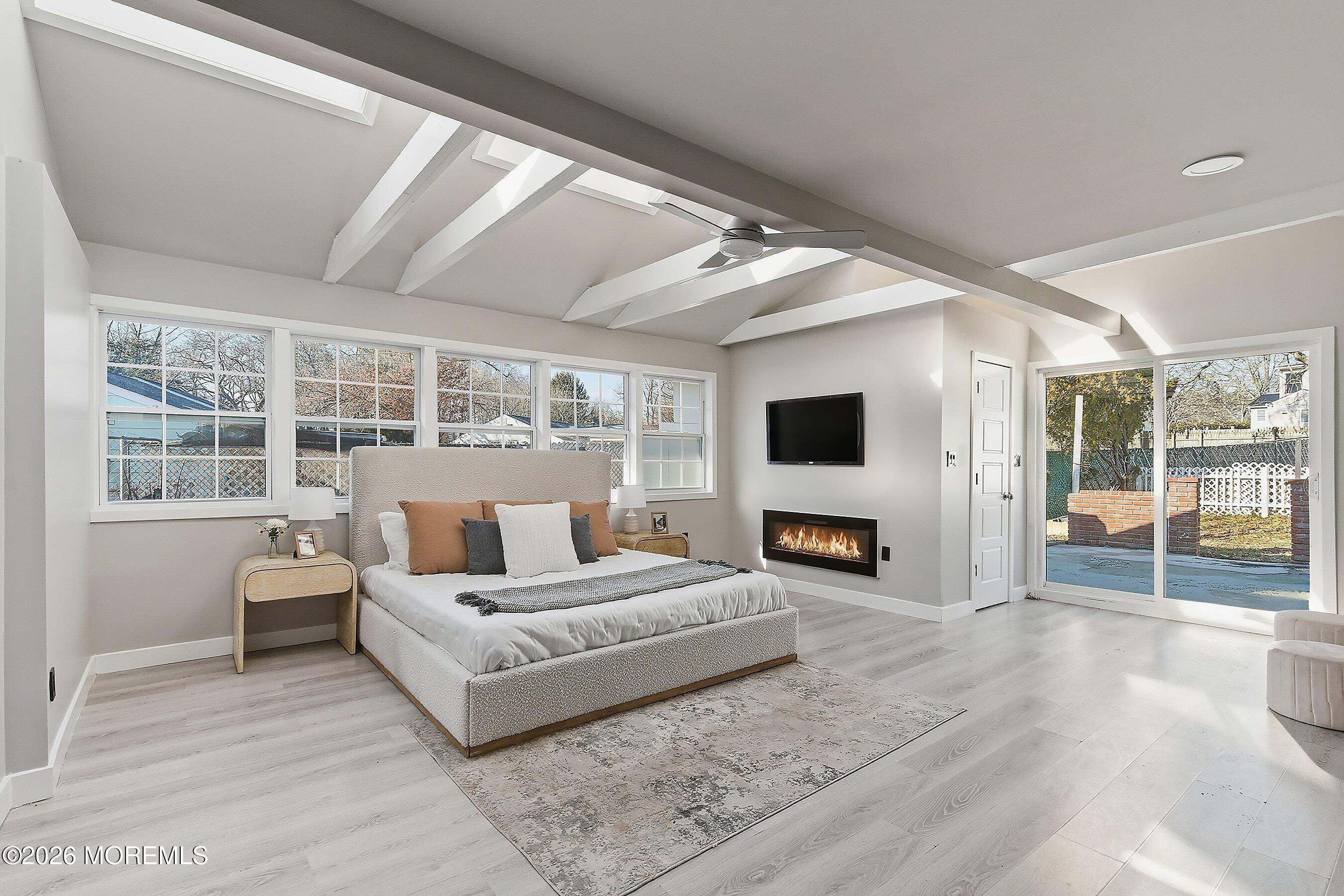 215 Sunset Lane Howell, NJ 07731 - Photo 15 of 27 a living room with furniture and a flat screen tv