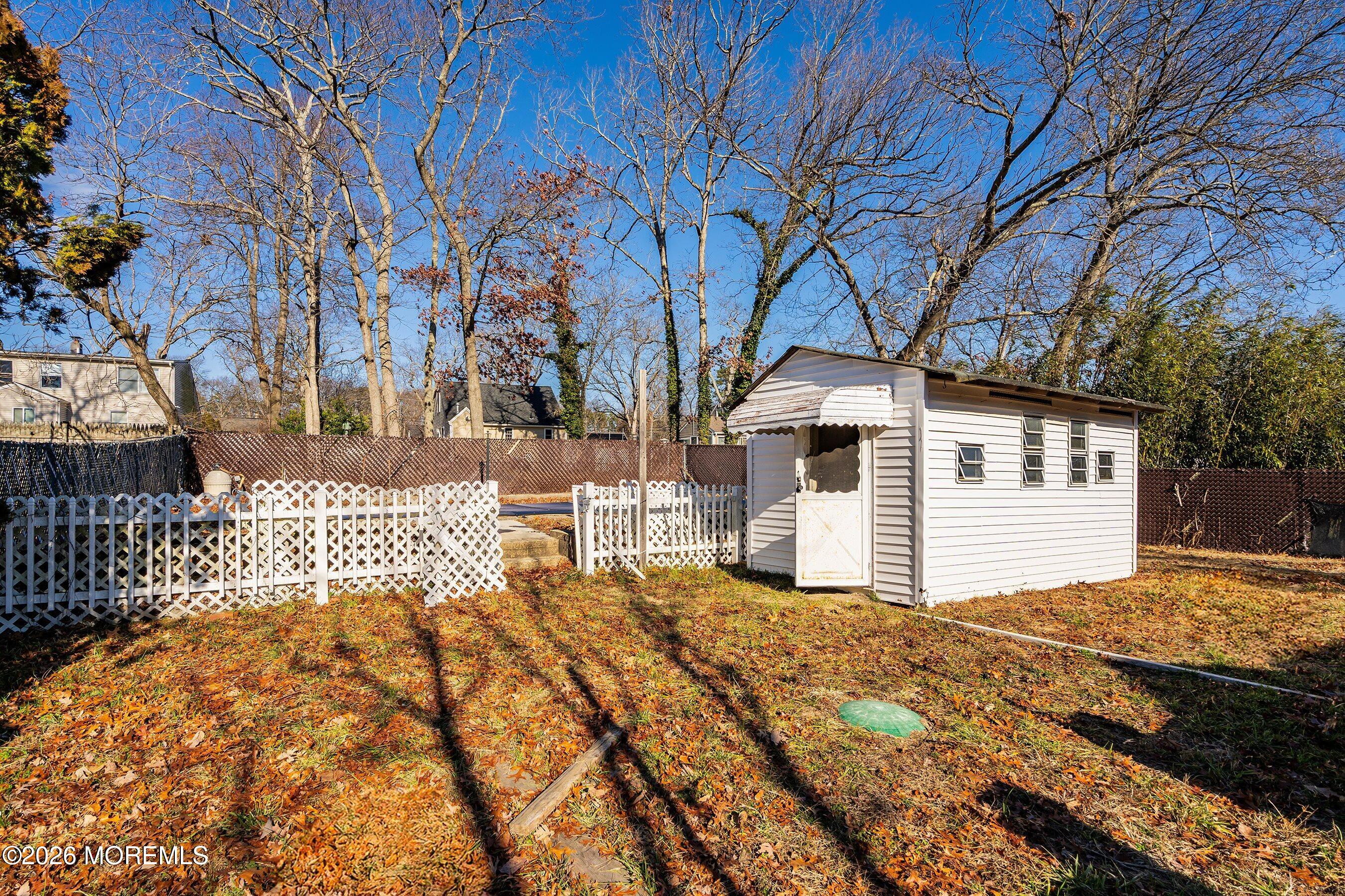 215 Sunset Lane Howell, NJ 07731 - Photo 25 of 27 a view of a house with snow on the background