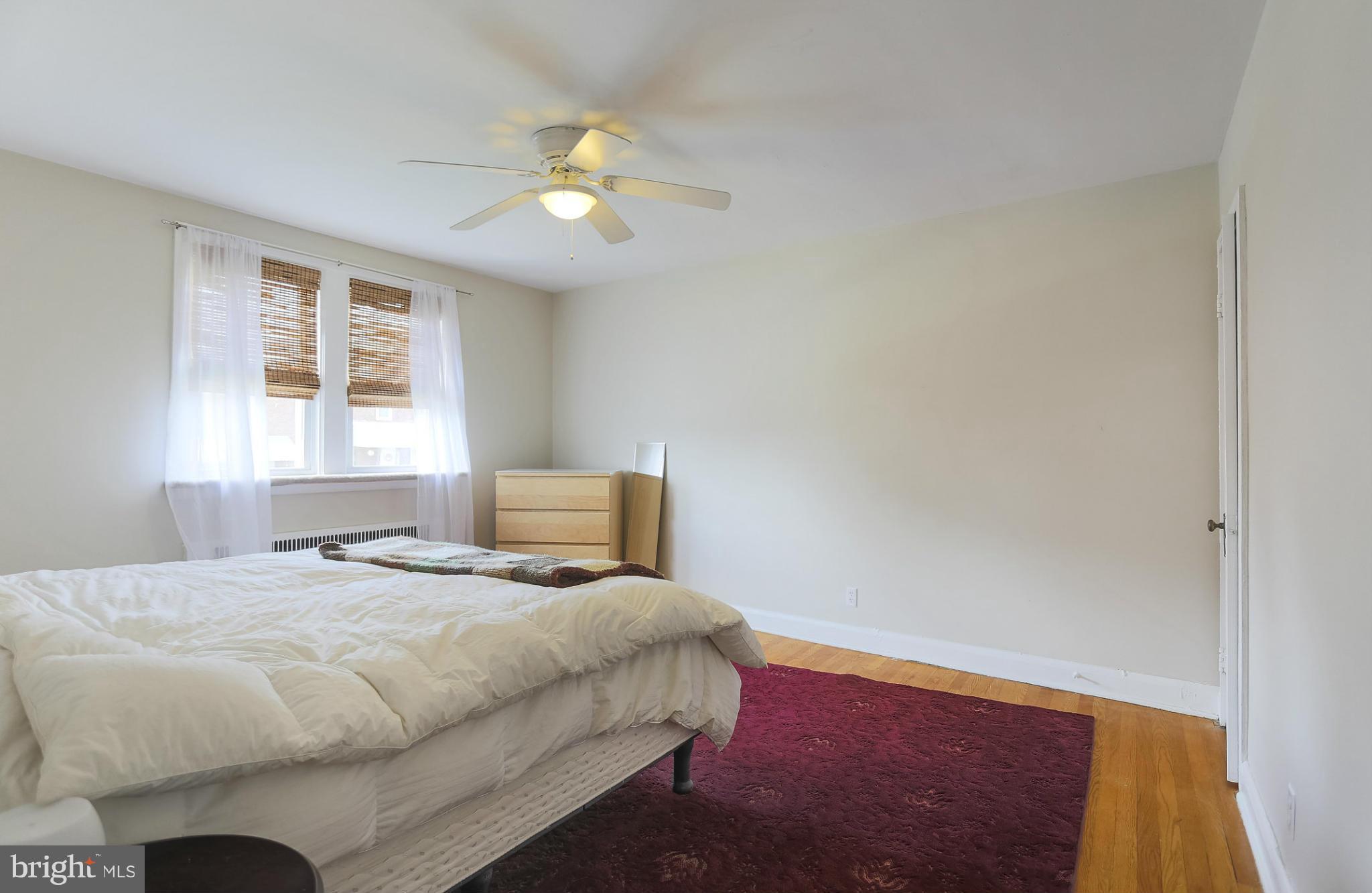 403 Overbrook Road Catonsville, MD 21228 - Photo 14 of 30 a bedroom with a bed and a window