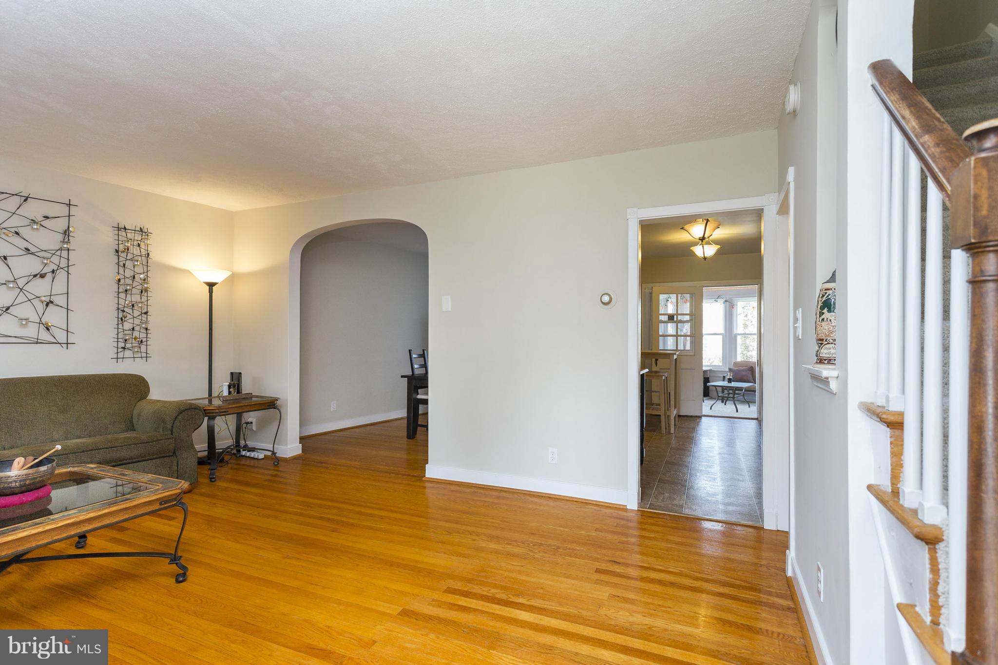 403 Overbrook Road Catonsville, MD 21228 - Photo 3 of 30 a view of livingroom with furniture and hardwood floor