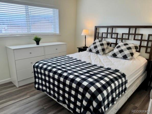 120 Norgren Road, Unit A B C Fraser, CO 80442 - Photo 12 of 39 a bedroom with a bed and a window