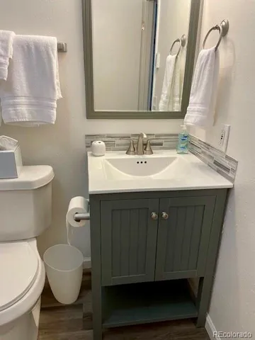 a bathroom with a toilet a sink and a bathtub