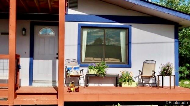 120 Norgren Road, Unit A B C Fraser, CO 80442 - Photo 17 of 39 a front view of a house with a porch