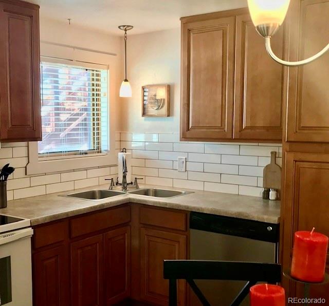 120 Norgren Road, Unit A B C Fraser, CO 80442 - Photo 20 of 39 a kitchen with a sink and cabinets