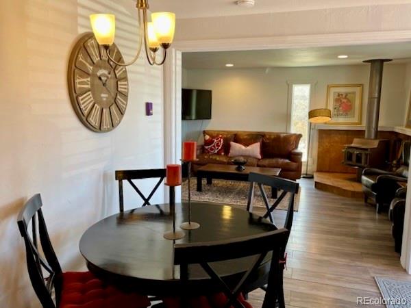 120 Norgren Road, Unit A B C Fraser, CO 80442 - Photo 22 of 39 a living room with furniture a mirror and a table