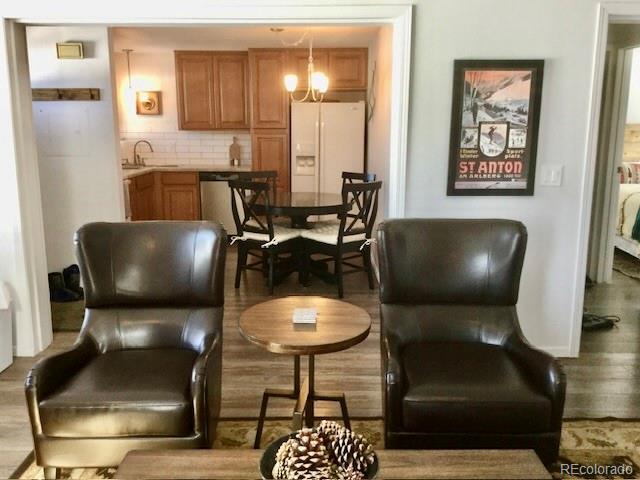 120 Norgren Road, Unit A B C Fraser, CO 80442 - Photo 23 of 39 a living room with furniture and a potted plant