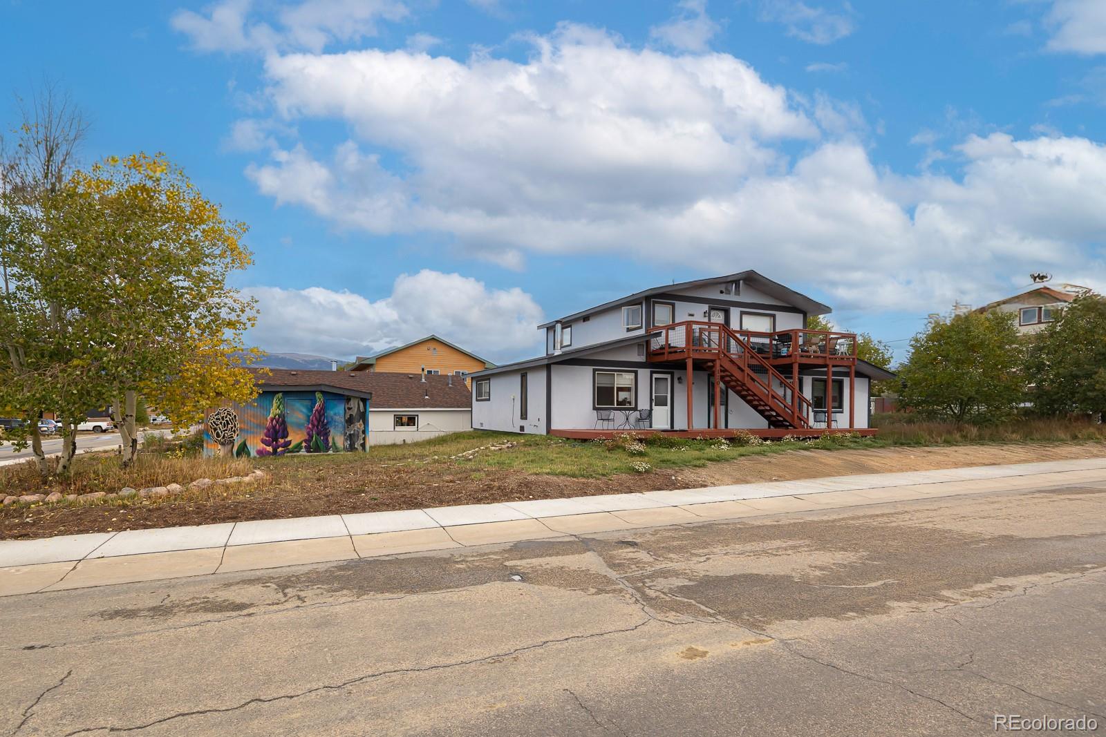 120 Norgren Road, Unit A B C Fraser, CO 80442 - Photo 3 of 39 a front view of a house with a yard