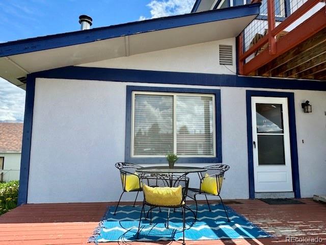 120 Norgren Road, Unit A B C Fraser, CO 80442 - Photo 7 of 39 a table and chairs in a patio