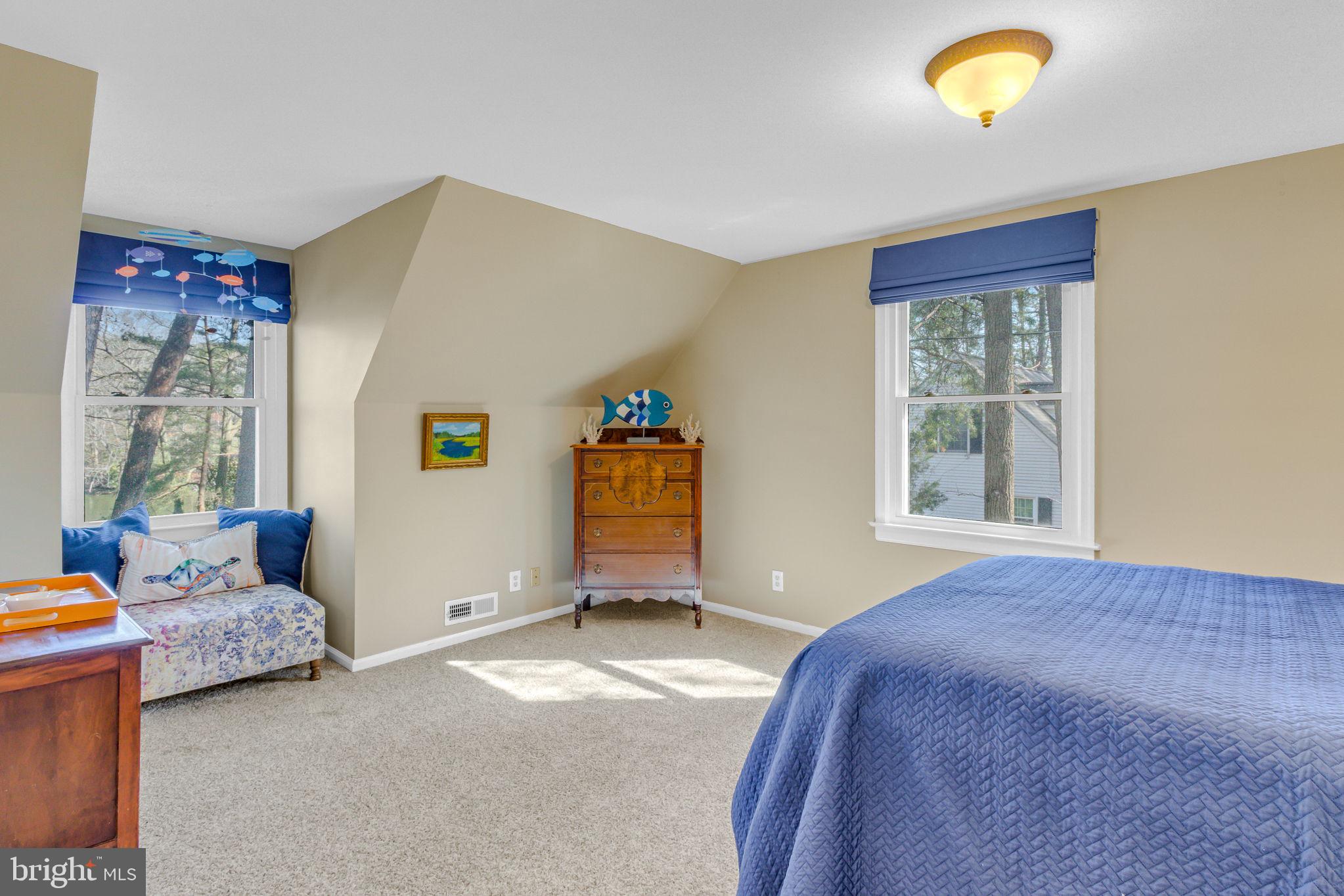 166 Nottingham Drive Reedville, VA 22539 - Photo 17 of 61 a bedroom with a bed and a window