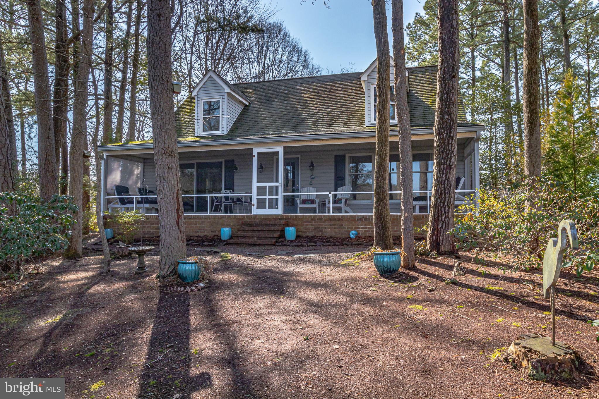 166 Nottingham Drive Reedville, VA 22539 - Photo 2 of 61 a view of a house with backyard and sitting area