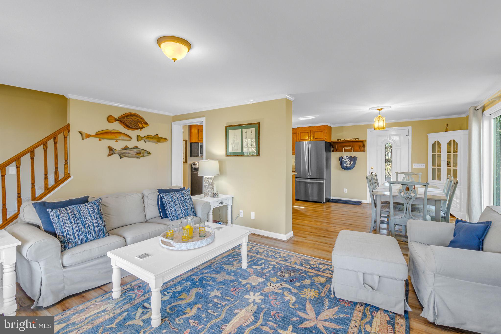 166 Nottingham Drive Reedville, VA 22539 - Photo 25 of 61 a living room with furniture and a rug