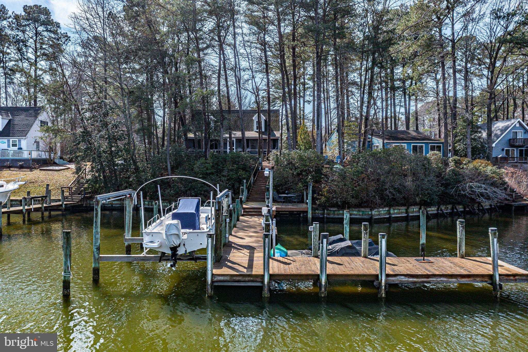 166 Nottingham Drive Reedville, VA 22539 - Photo 38 of 61 a view of boats in middle of a lake