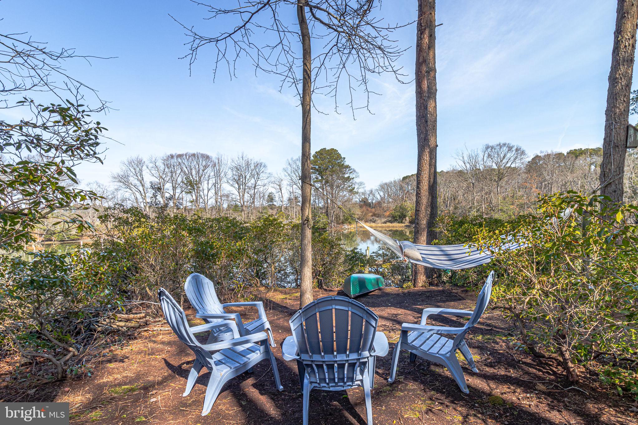 166 Nottingham Drive Reedville, VA 22539 - Photo 49 of 61 a view of a chairs and table in patio