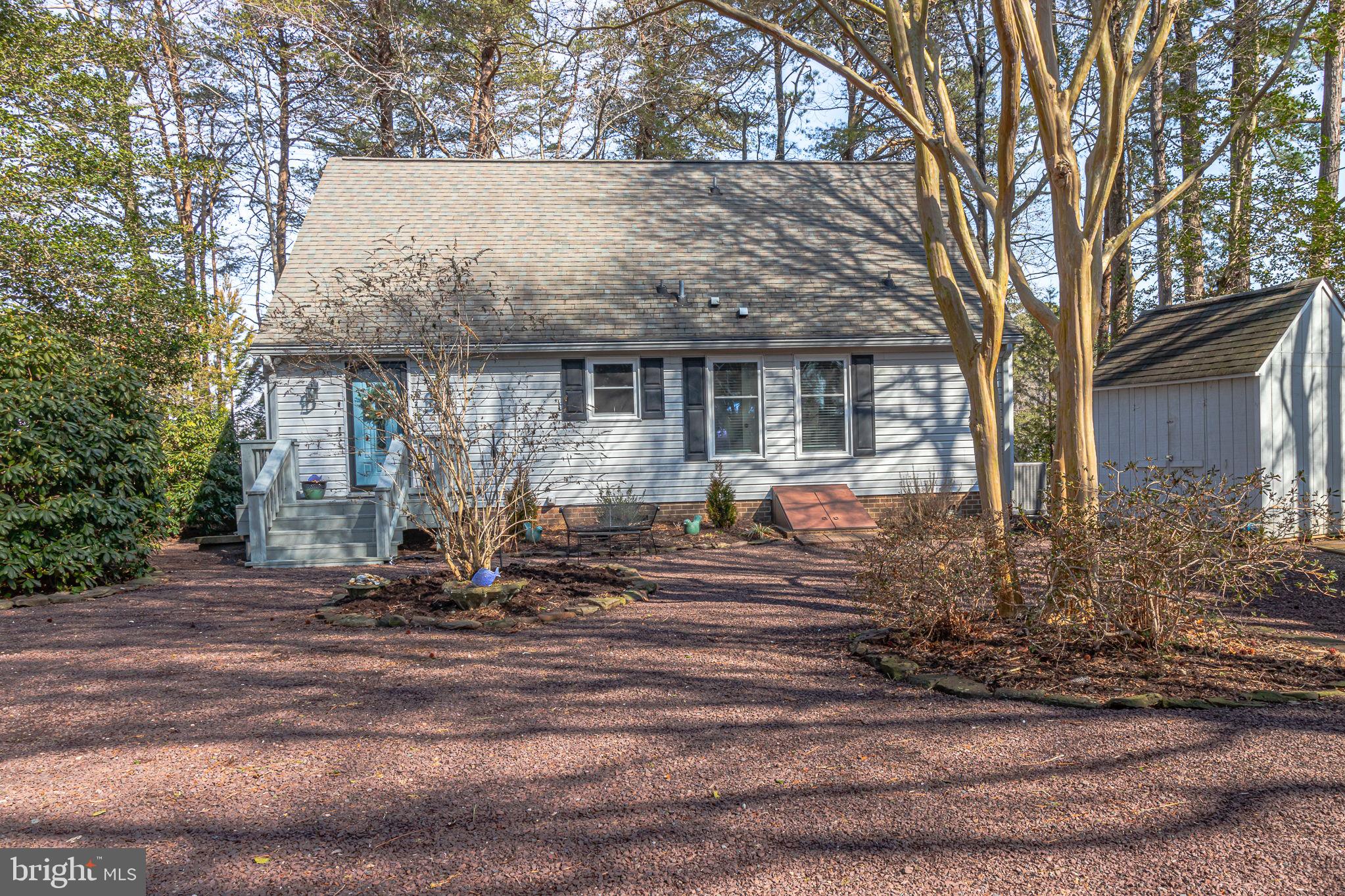 166 Nottingham Drive Reedville, VA 22539 - Photo 60 of 61 a front view of house with small garden