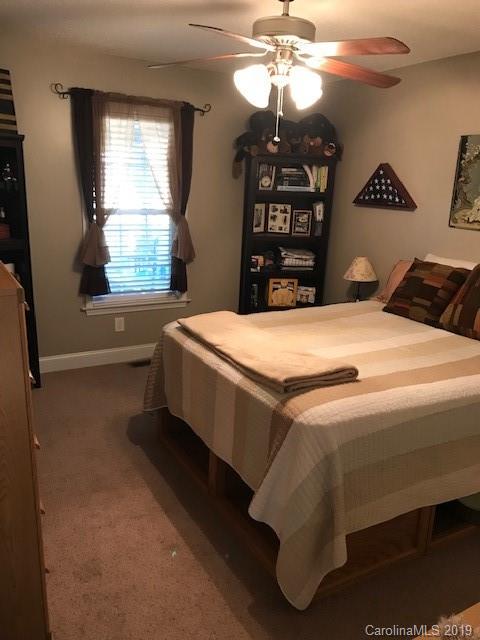190 Teague Road, Unit 5 Salisbury, NC 28146 - Photo 4 of 26 a bedroom with a bed and a dresser