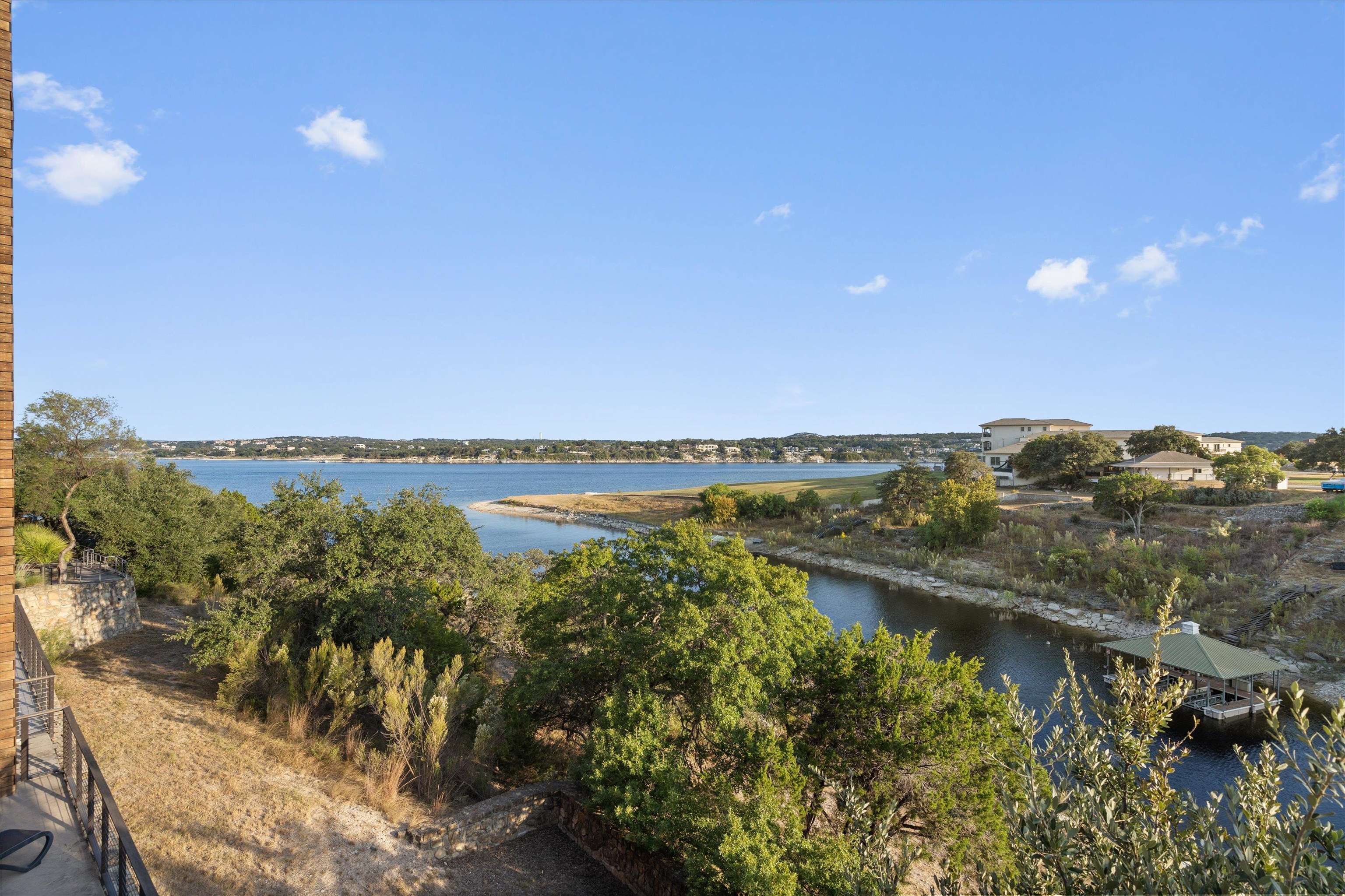 1101 Ivean Pearson Road Lago Vista, TX 78645 - Photo 22 of 30 a view of a lake with a mountain in the background