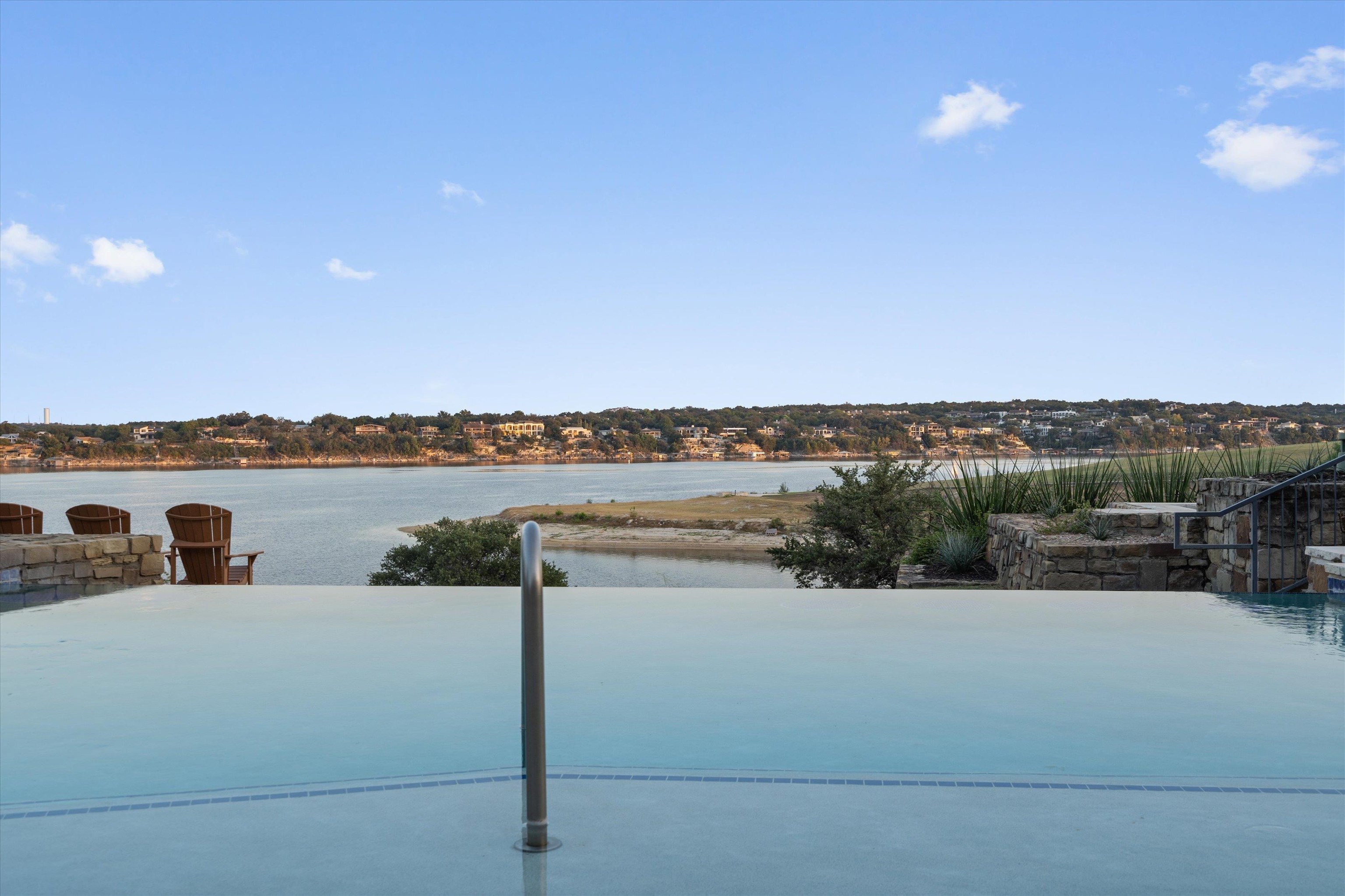 1101 Ivean Pearson Road Lago Vista, TX 78645 - Photo 24 of 30 a view of a lake with houses in the back