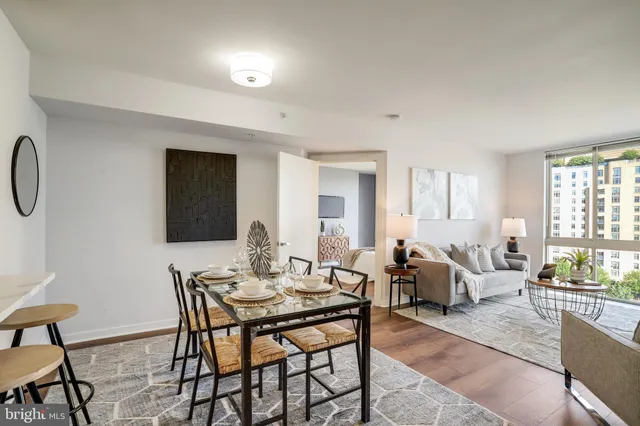 a view of a livingroom with furniture and window