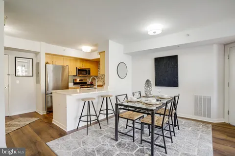 a view of a dining room with furniture