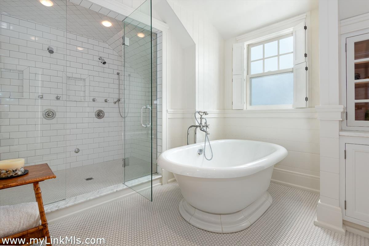 37 Sankaty Head Road Nantucket, MA 02554 - Photo 41 of 65 a white bath tub sitting next to a shower