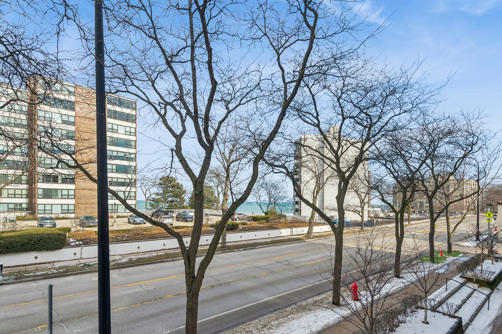 1625 Sheridan Road, Unit 204 Wilmette, IL 60091 - Photo 12 of 16 a view of a yard and trees