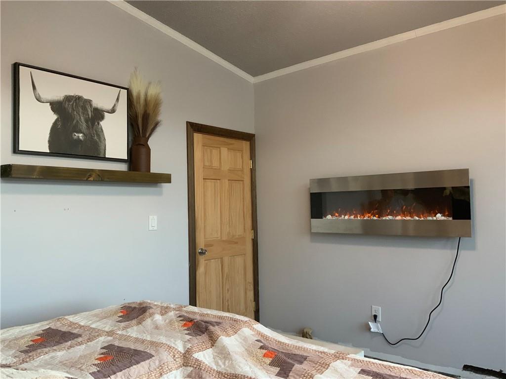20 Moore Road West Alexander, PA 15376 - Photo 21 of 24 a bedroom with a bed and painting on the wall