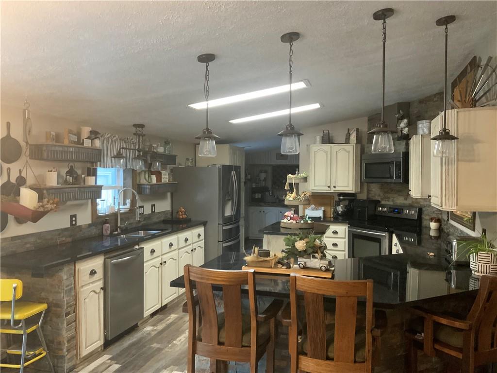 20 Moore Road West Alexander, PA 15376 - Photo 10 of 24 a kitchen with lots of counter space and appliances