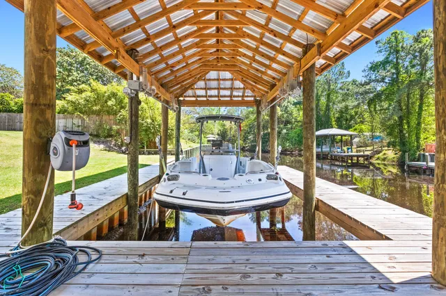 a view of a patio with wooden floor
