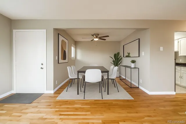 a view of a livingroom with furniture and wooden floor