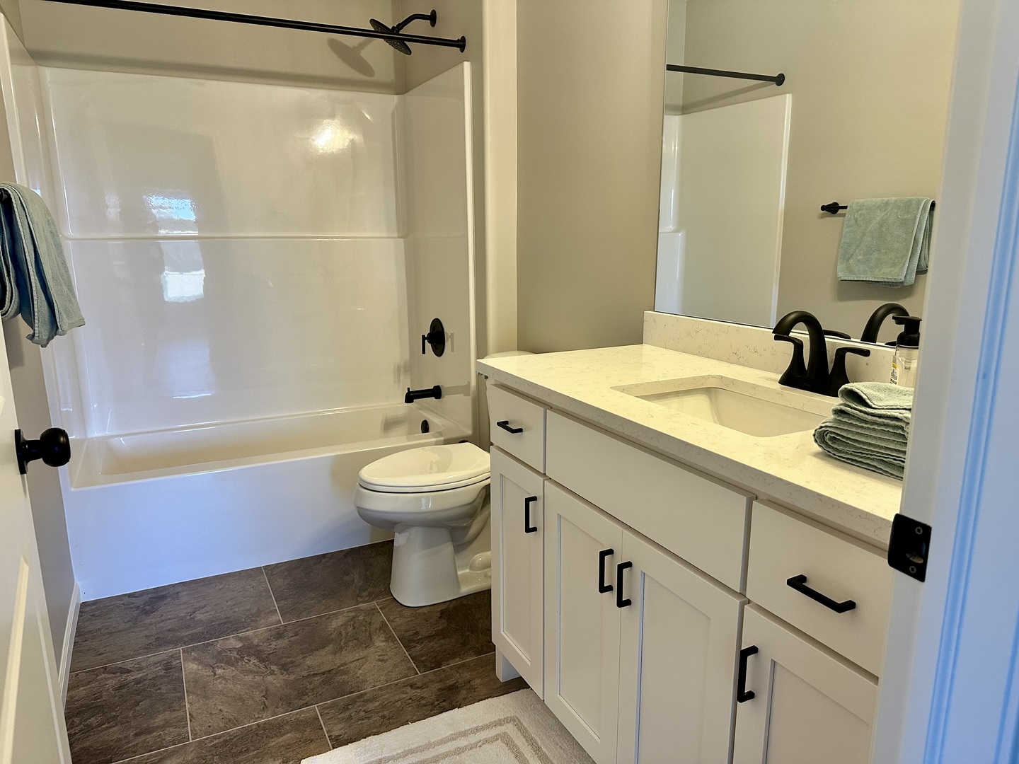 1319 Sioux Turn Kankakee, IL 60901 - Photo 9 of 16 a bathroom with a sink toilet and shower
